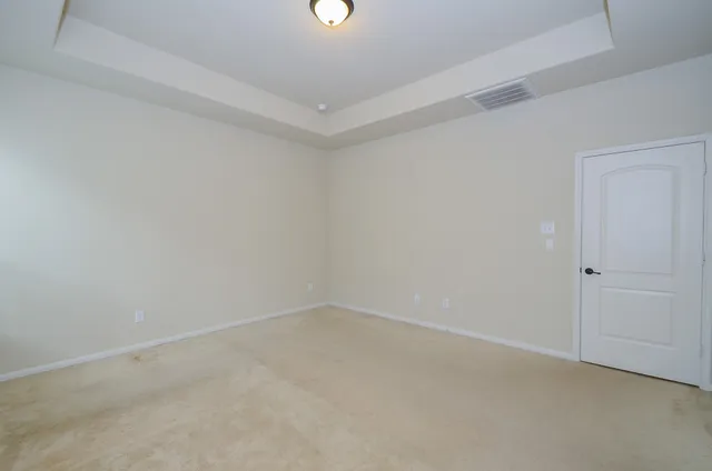 a bathroom with a double vanity sink and mirror
