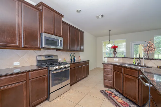 a view of a livingroom with wooden floor