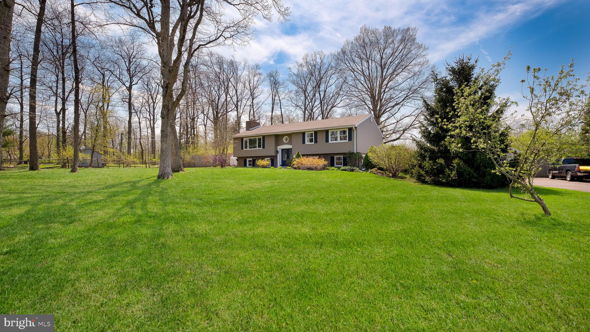 152 Blooming Glen Road Perkasie, PA 18944 - Photo 2 of 37 a view of a house with a big yard
