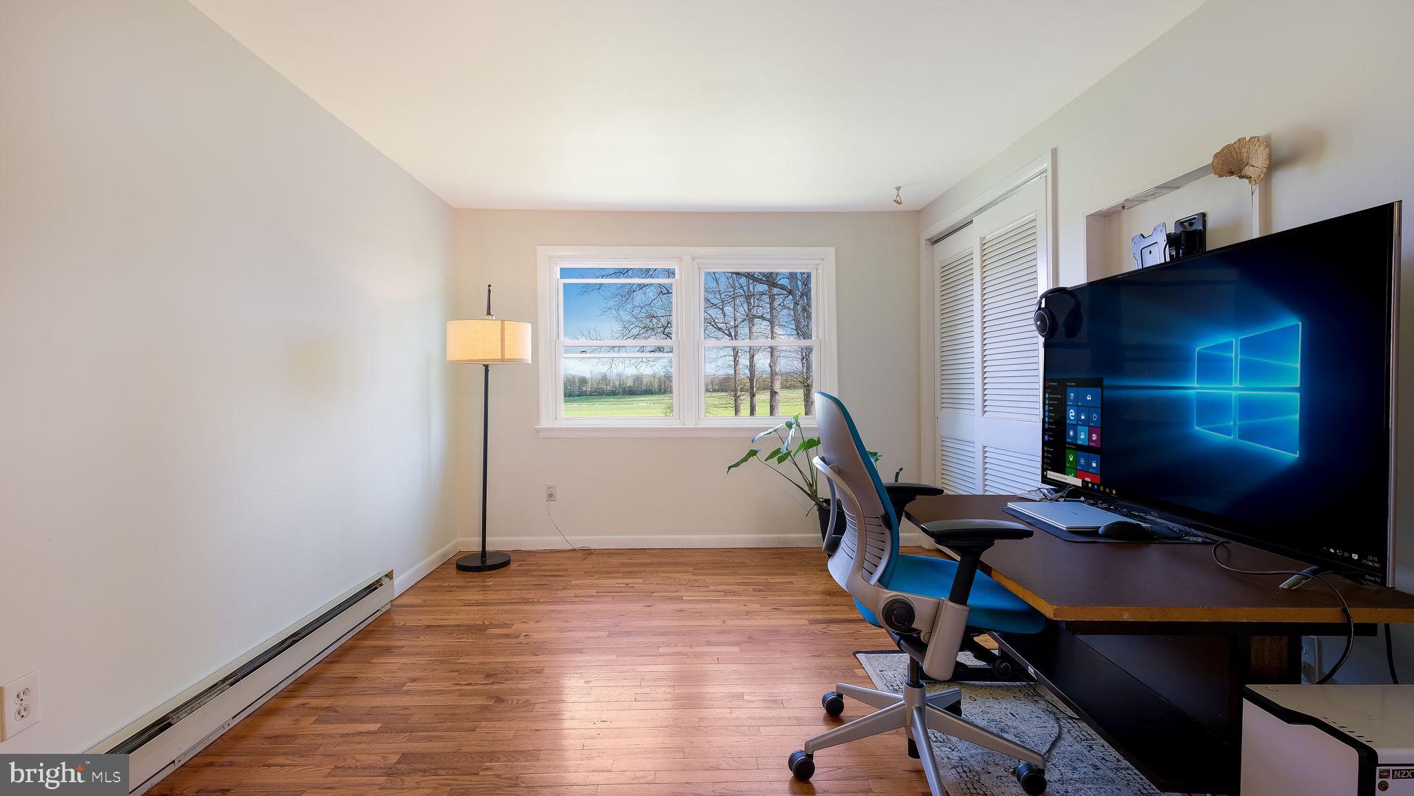 152 Blooming Glen Road Perkasie, PA 18944 - Photo 23 of 37 a view of a workspace with furniture and a window