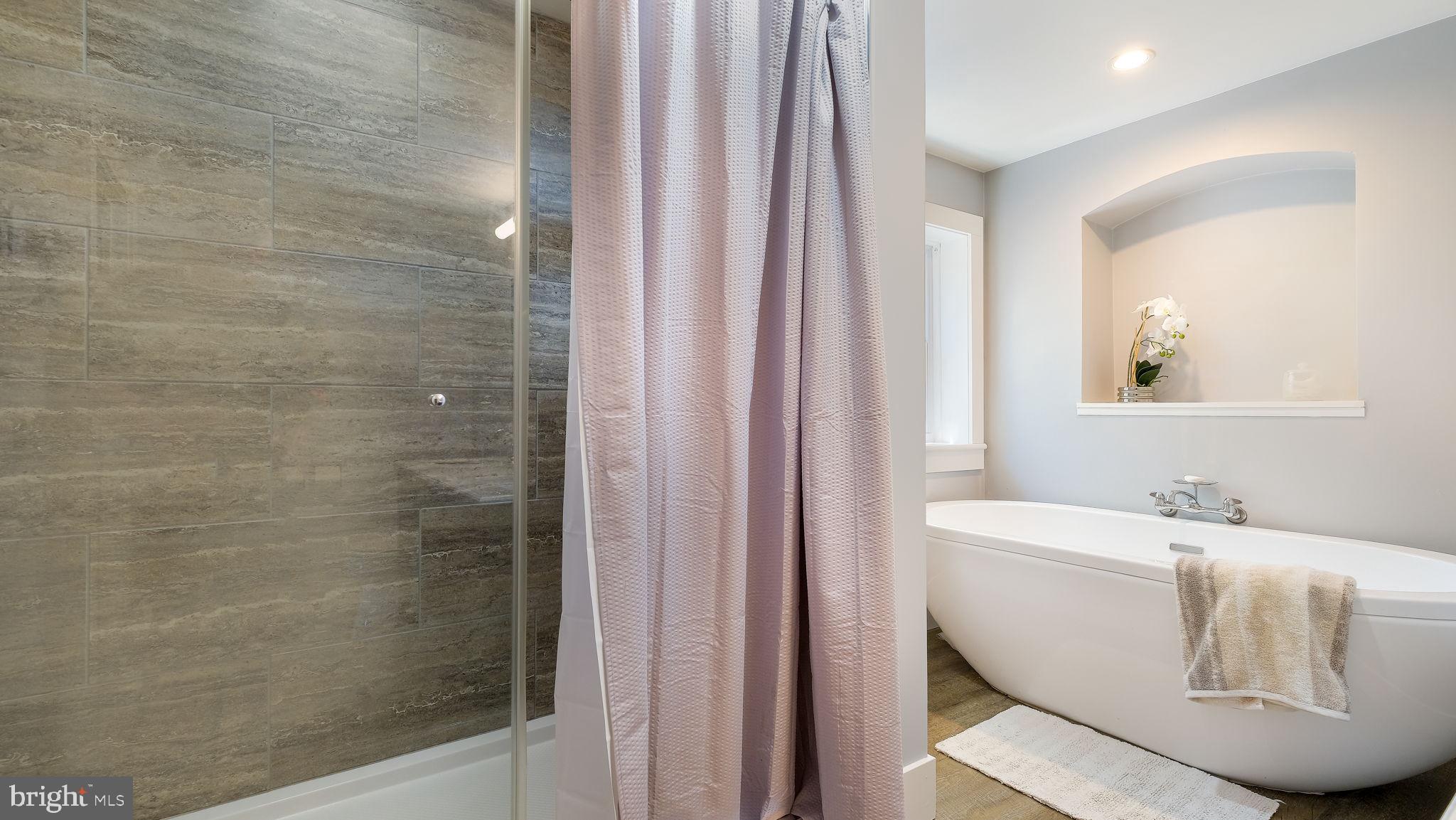 152 Blooming Glen Road Perkasie, PA 18944 - Photo 28 of 37 a view of a bathtub in a bathroom