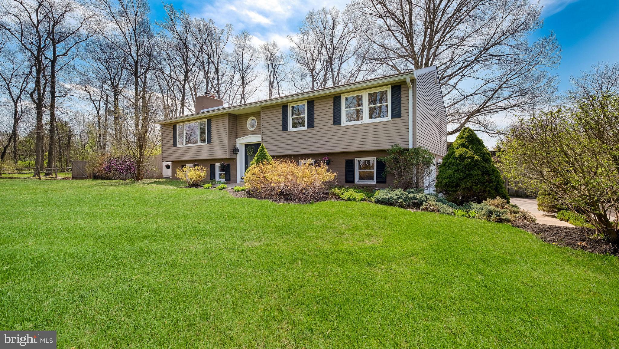 152 Blooming Glen Road Perkasie, PA 18944 - Photo 3 of 37 a front view of house with yard and green space