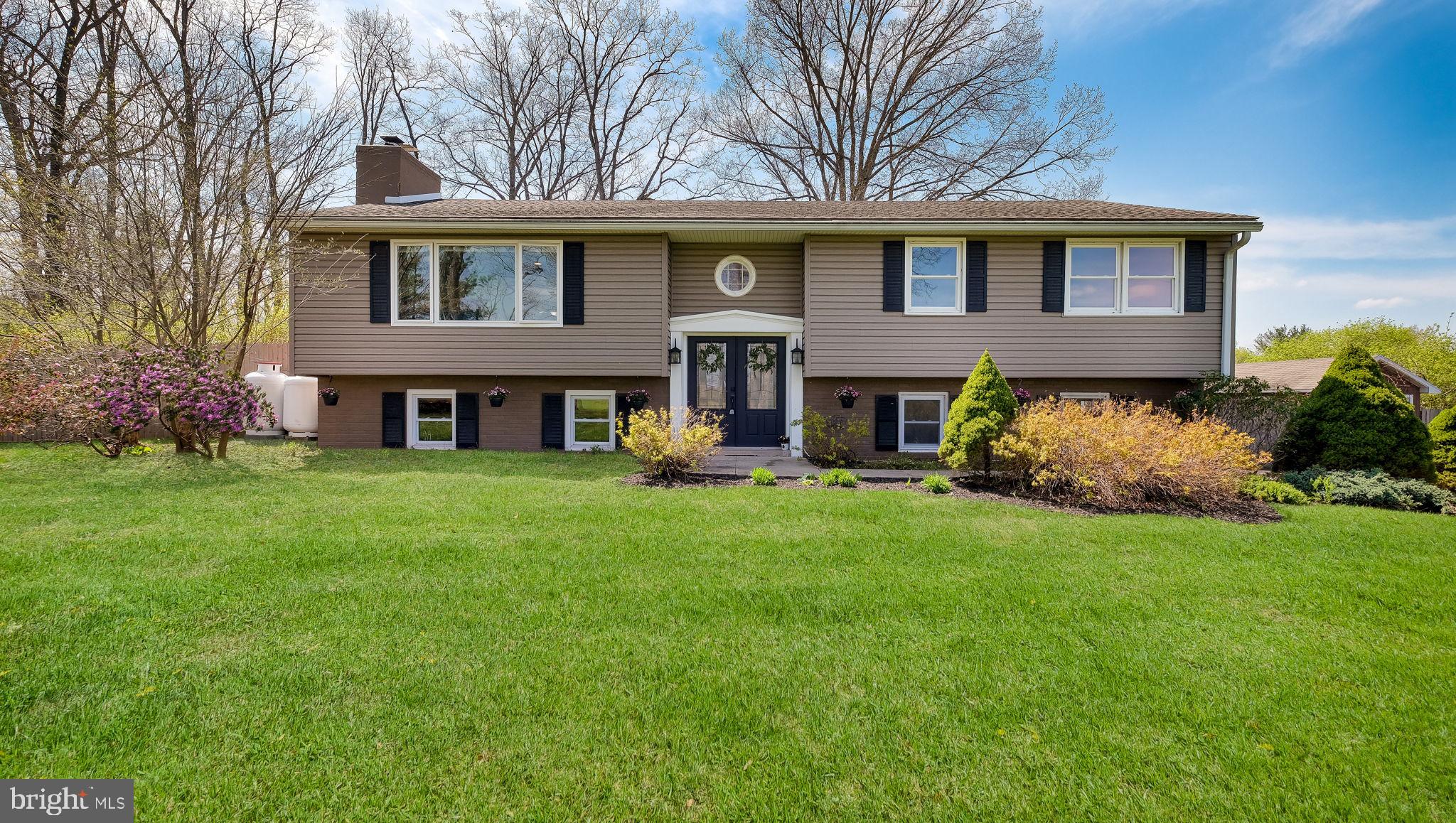 152 Blooming Glen Road Perkasie, PA 18944 - Photo 4 of 37 a view of a house with a yard