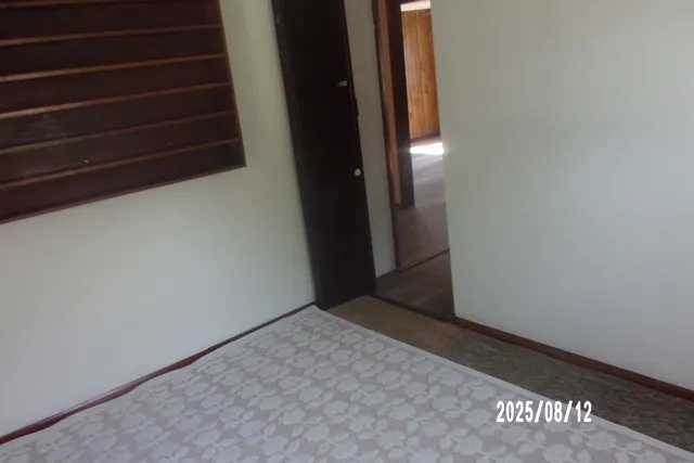 a kitchen with granite countertop a sink and cabinets