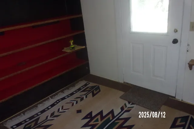 an empty room with a door