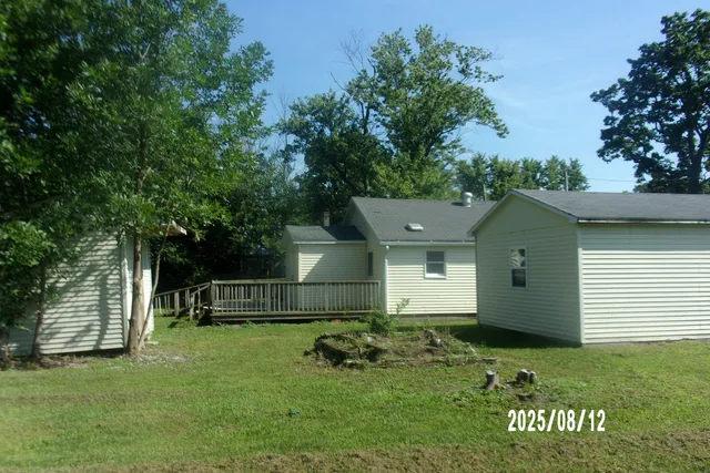 a house view with a garden space
