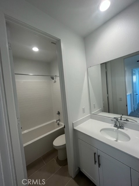 31373 Trappers Loop Winchester, CA 92596 - Photo 9 of 15 a bathroom with a sink a toilet and shower