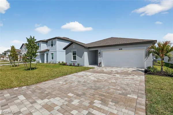 a view of a swimming pool with a yard
