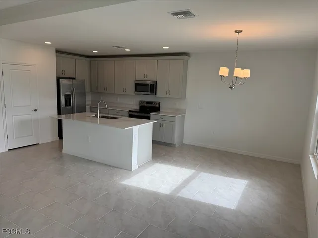 $299,990 | 253 Moonlit Lk Trail, Lehigh Acres, FL 33974