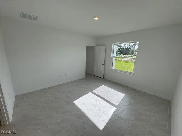 $299,990 | 253 Moonlit Lk Trail, Lehigh Acres, FL 33974