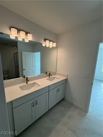 $299,990 | 253 Moonlit Lk Trail, Lehigh Acres, FL 33974