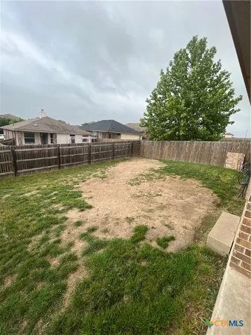 a view of a swimming pool with an ocean view