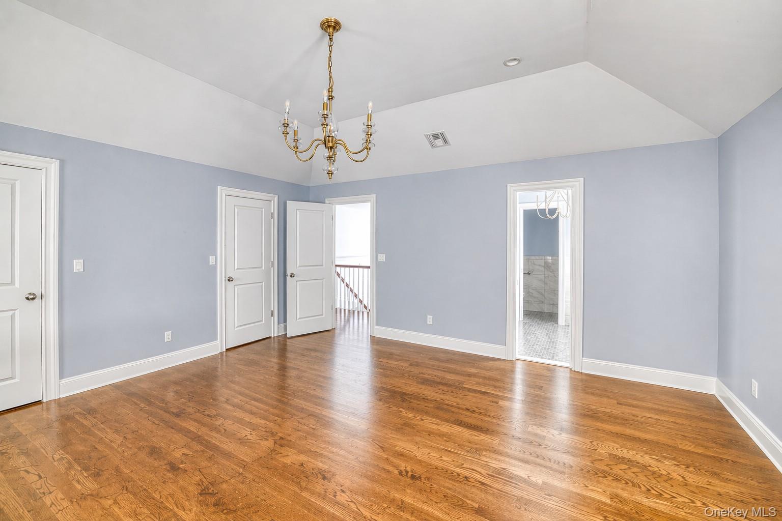 42 Skunks Misery Road Locust Valley, NY 11560 - Photo 24 of 50 Primary bedroom with dual walk in closets, edited with furniture virtually removed