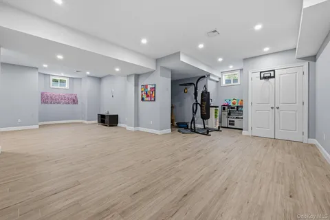 an empty room with wooden floor