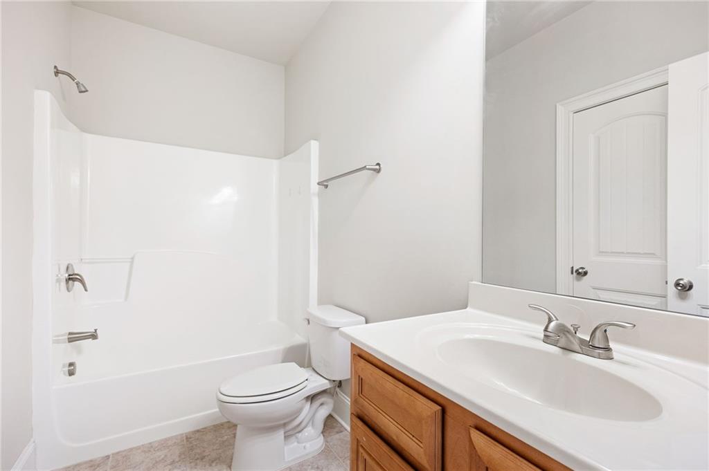 66 Lanier Ridge Acworth, GA 30101 - Photo 13 of 53 a bathroom with a sink toilet and shower