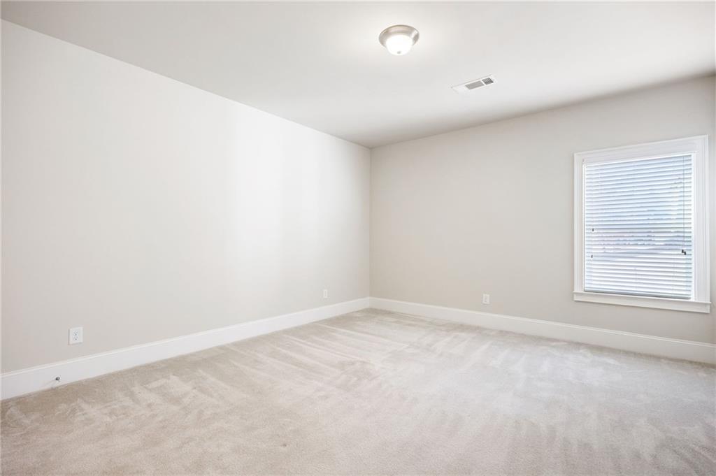 66 Lanier Ridge Acworth, GA 30101 - Photo 14 of 53 an empty room with a window