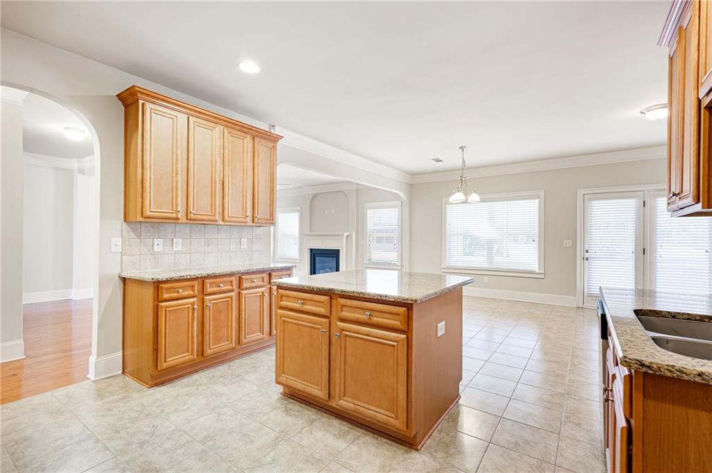 66 Lanier Ridge Acworth, GA 30101 - Photo 26 of 53 a kitchen with stainless steel appliances granite countertop a stove a sink and a microwave