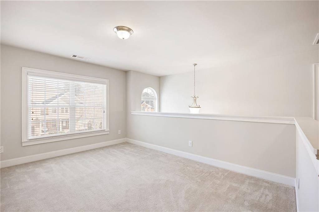 66 Lanier Ridge Acworth, GA 30101 - Photo 31 of 53 an empty room with a window