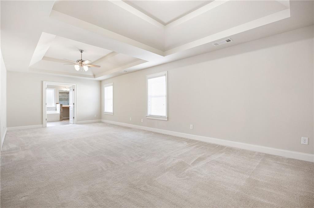66 Lanier Ridge Acworth, GA 30101 - Photo 34 of 53 a view of an empty room with a window