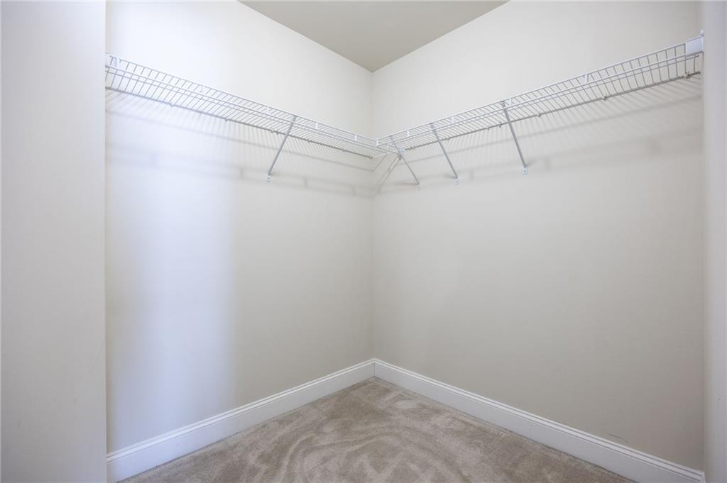 66 Lanier Ridge Acworth, GA 30101 - Photo 35 of 53 a view of a room with racks on the wall