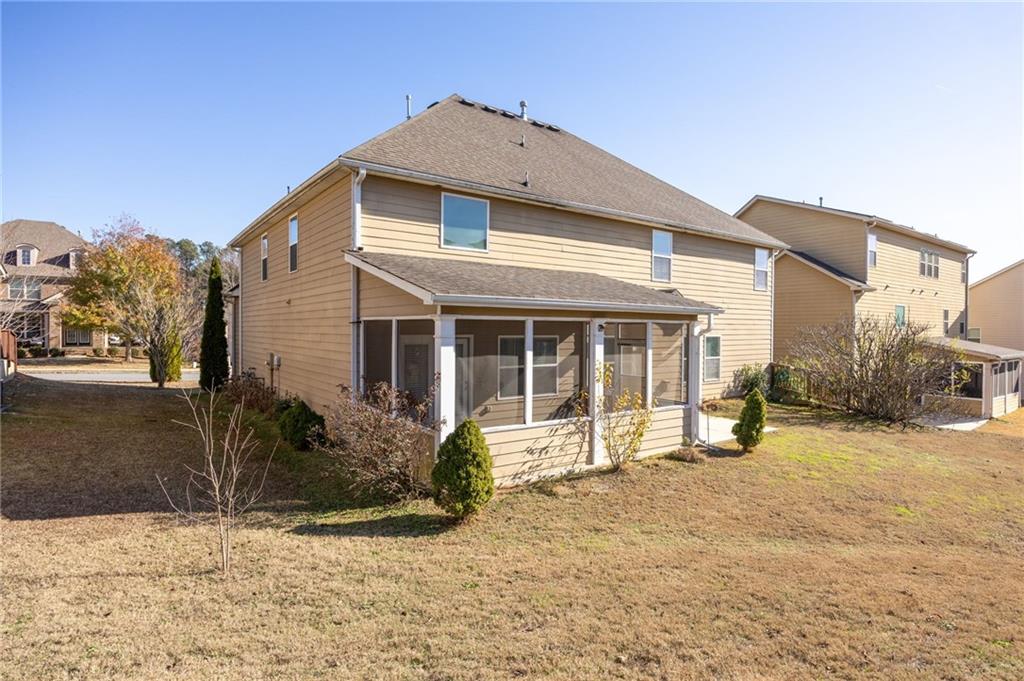 66 Lanier Ridge Acworth, GA 30101 - Photo 47 of 53 a front view of a house with a yard and garage