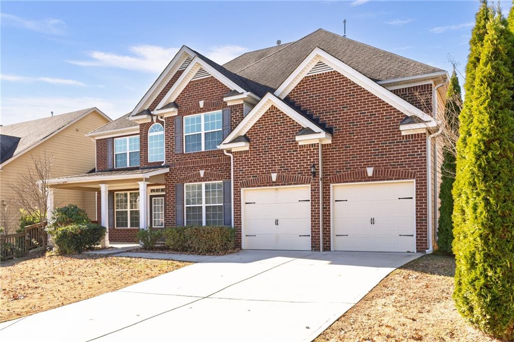 66 Lanier Ridge Acworth, GA 30101 - Photo 49 of 53 a front view of a house with a yard