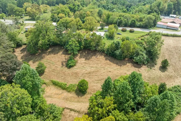 a view of a lake with a yard