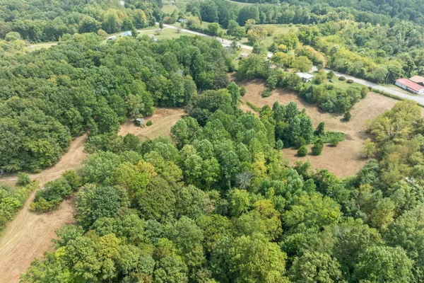 a view of a lake with a house