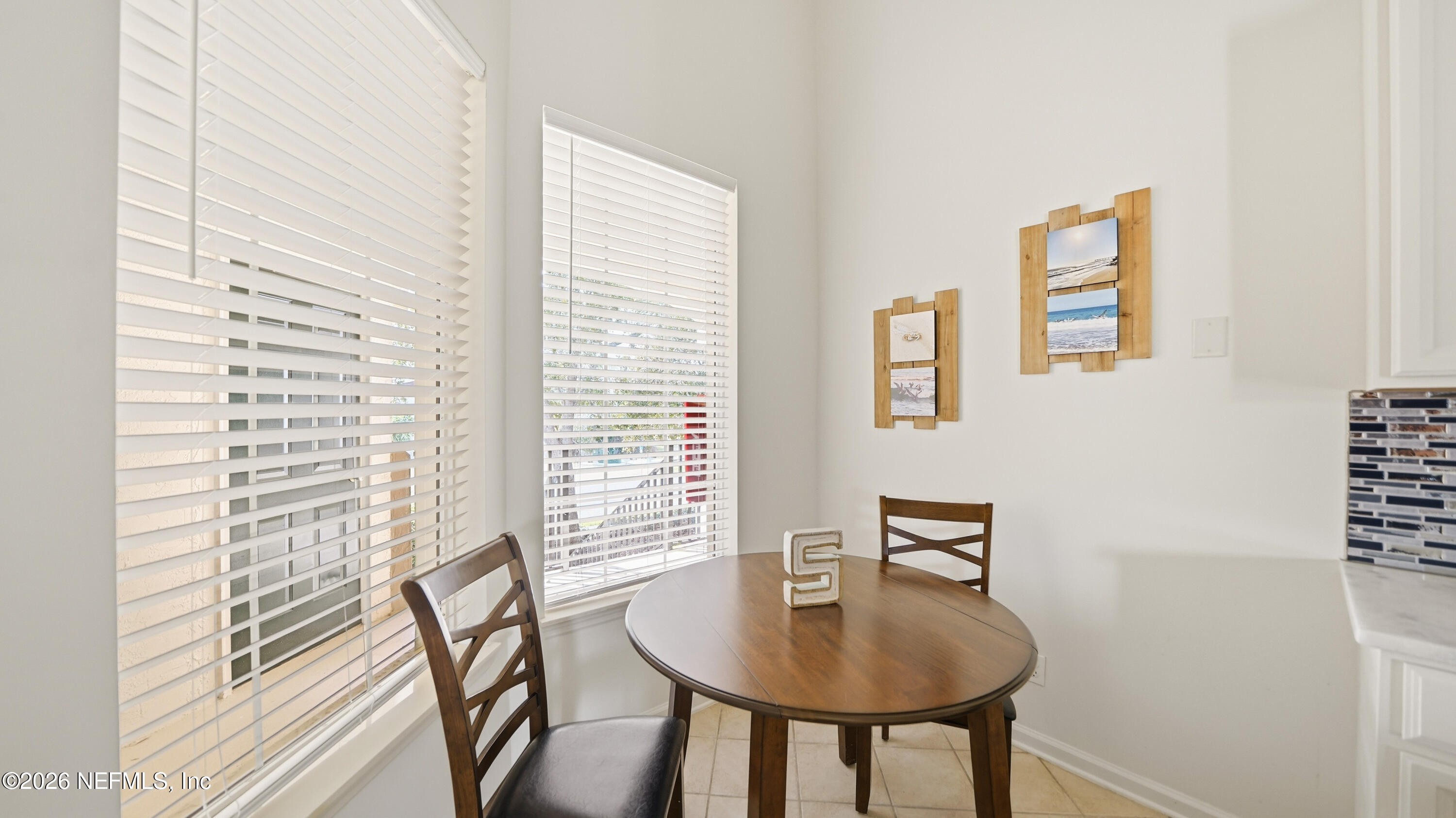 705 Augusta Circle St. Augustine, FL 32086 - Photo 15 of 53 a workspace with furniture and a window