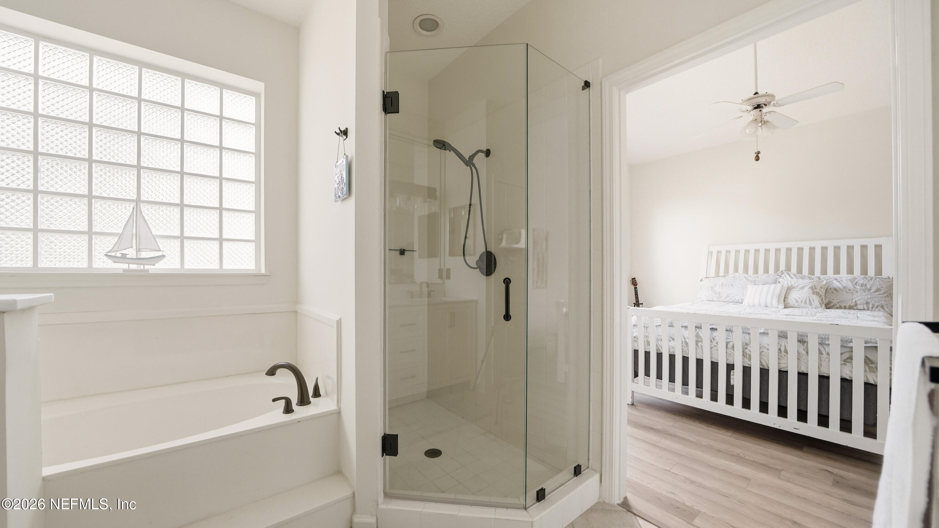 705 Augusta Circle St. Augustine, FL 32086 - Photo 23 of 53 a bathroom with a bathtub and shower