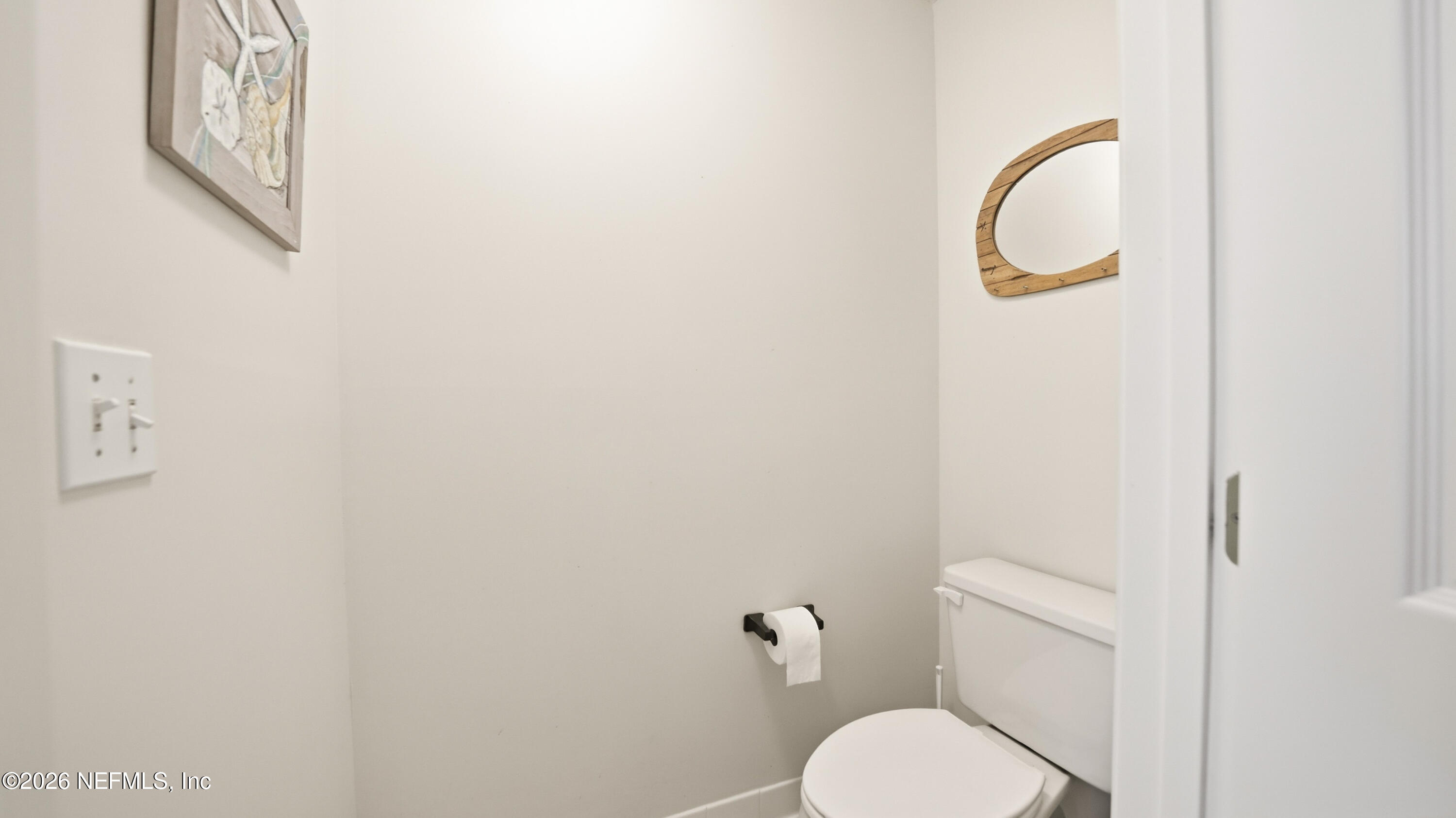 705 Augusta Circle St. Augustine, FL 32086 - Photo 24 of 53 a white toilet sitting next to a shower