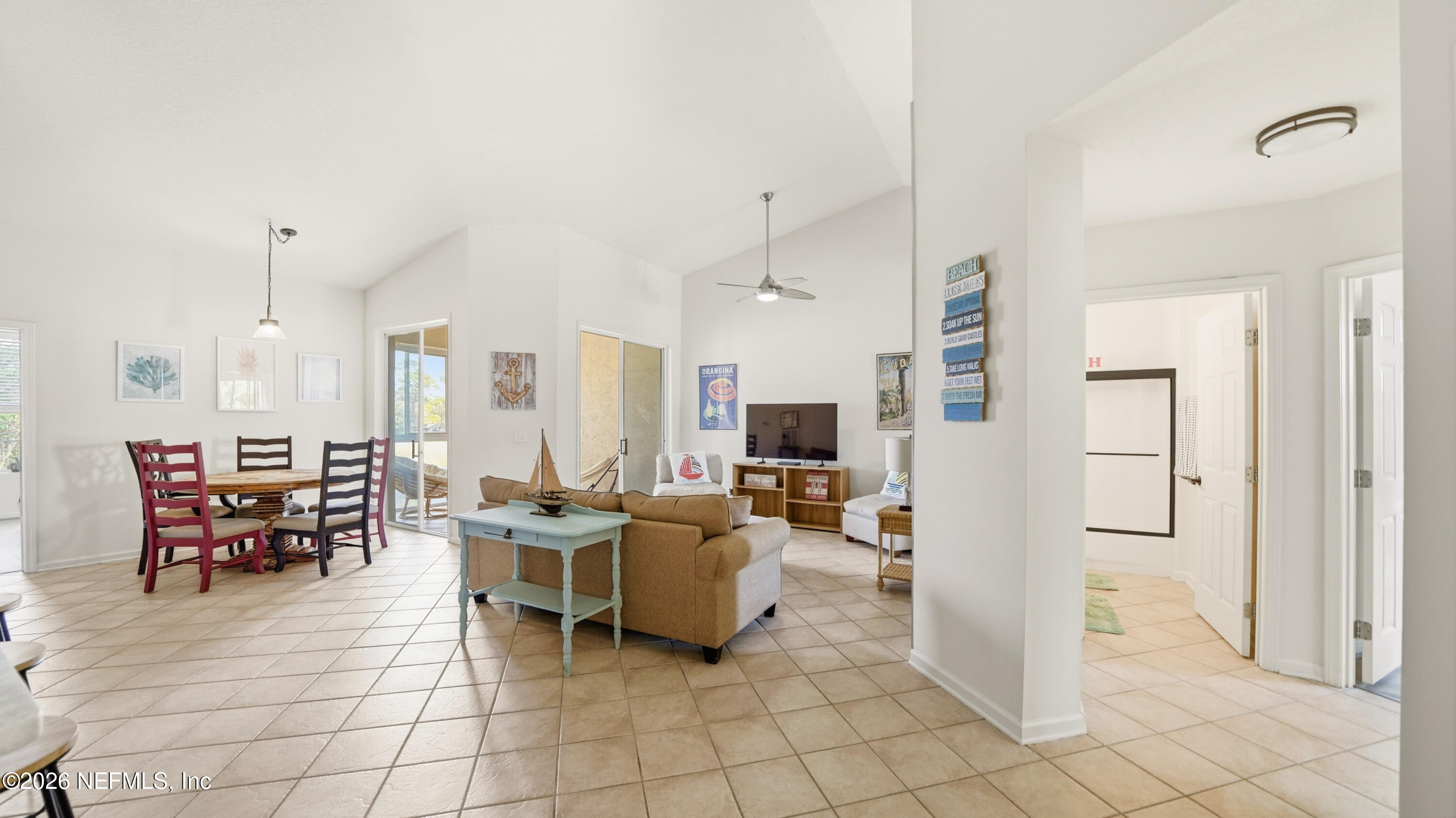705 Augusta Circle St. Augustine, FL 32086 - Photo 27 of 53 a view of a livingroom with furniture and a flat screen tv