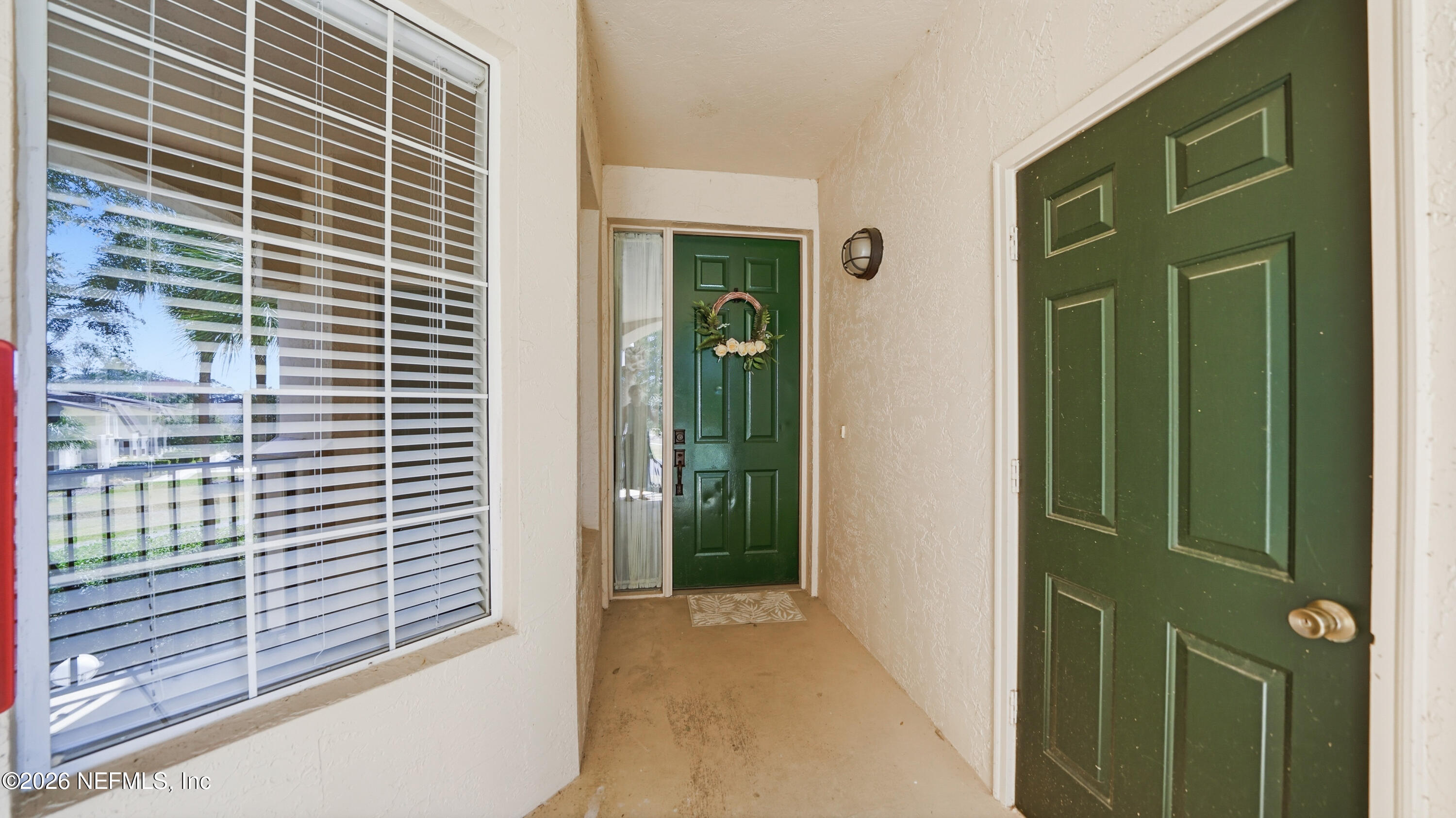 705 Augusta Circle St. Augustine, FL 32086 - Photo 34 of 53 a view of a door and a window