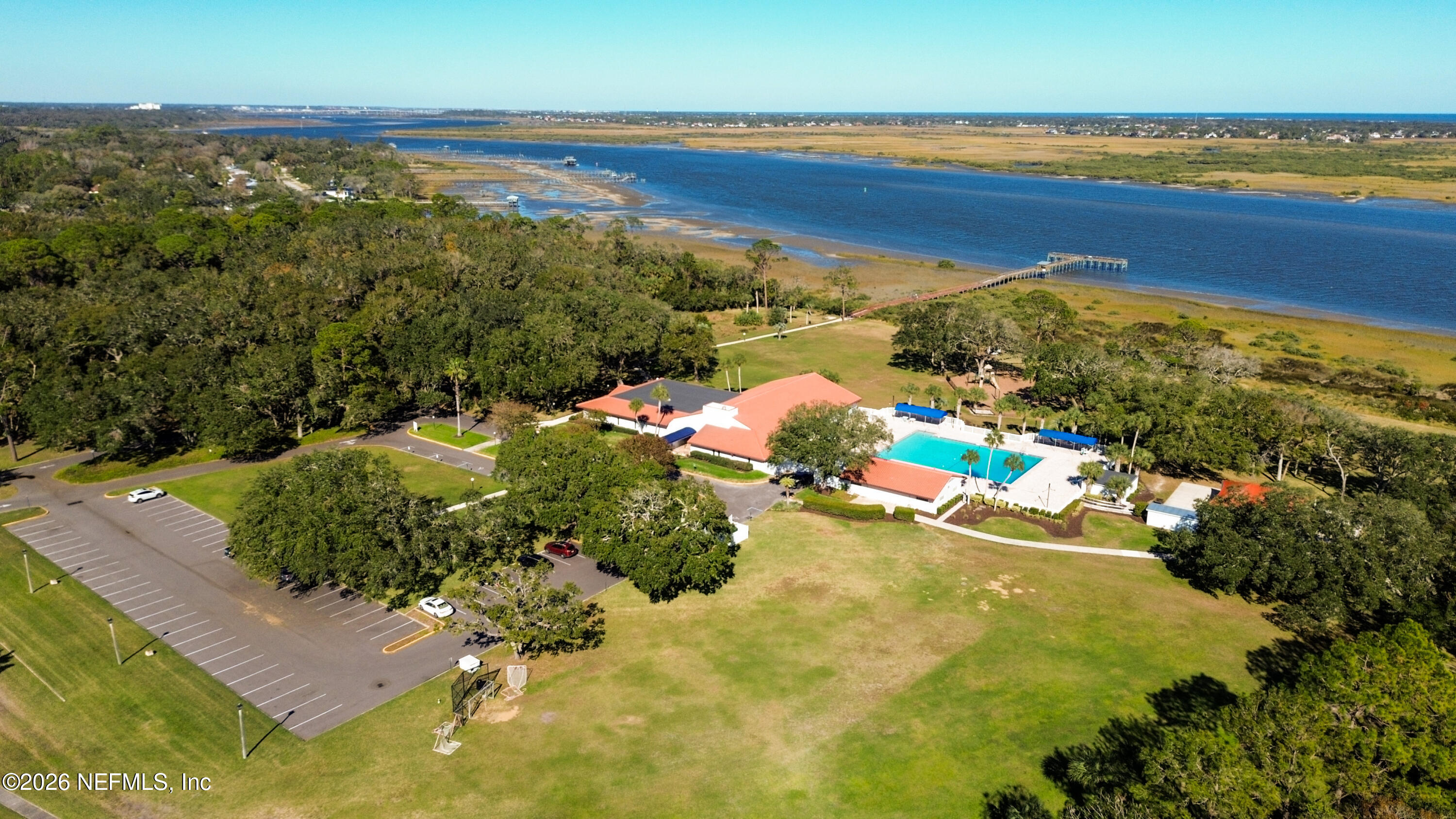 705 Augusta Circle St. Augustine, FL 32086 - Photo 52 of 53 a view of a lake with a mountain