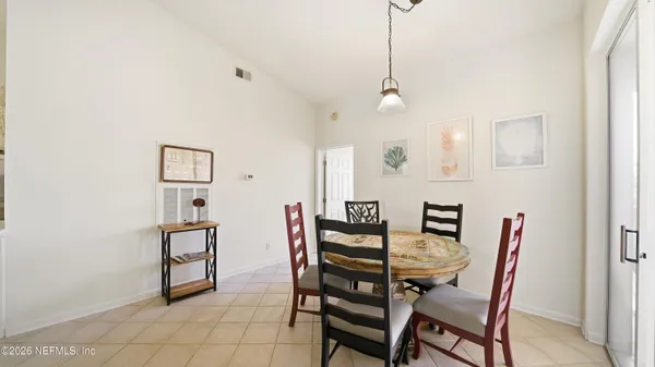 a view of a a dining room with furniture