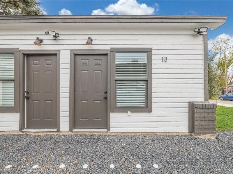 905 74th Street, Unit 3 Houston, TX 77011 - Photo 1 of 10 a view of a house with a window and door