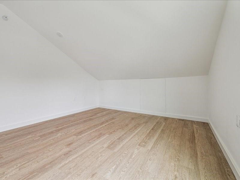 905 74th Street, Unit 3 Houston, TX 77011 - Photo 8 of 10 a view of empty room with wooden floor