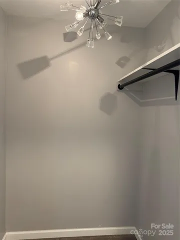 a view of small space with racks on the wall