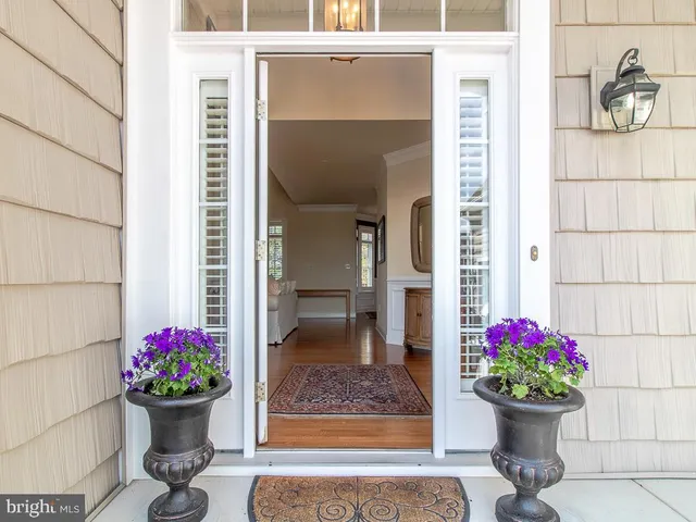 a view of a dining room with a potted plant