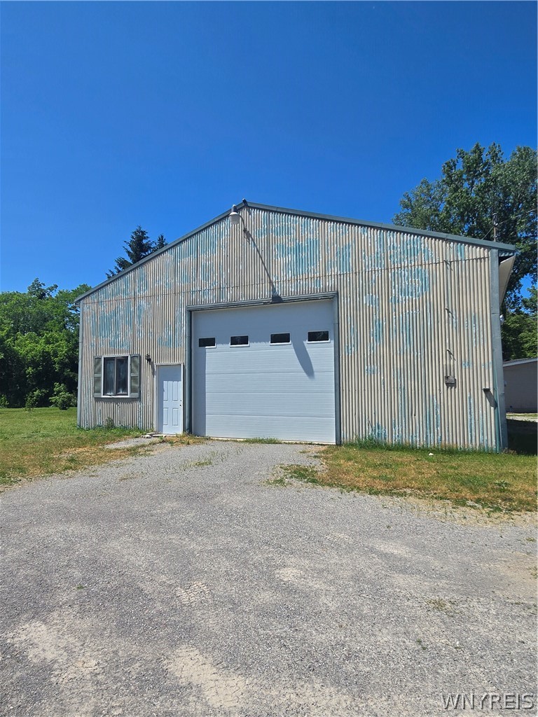 12507 Ridge Road Ridgeway, NY 14103 - Photo 19 of 22 detached 6 car garage with electric, heat, water h