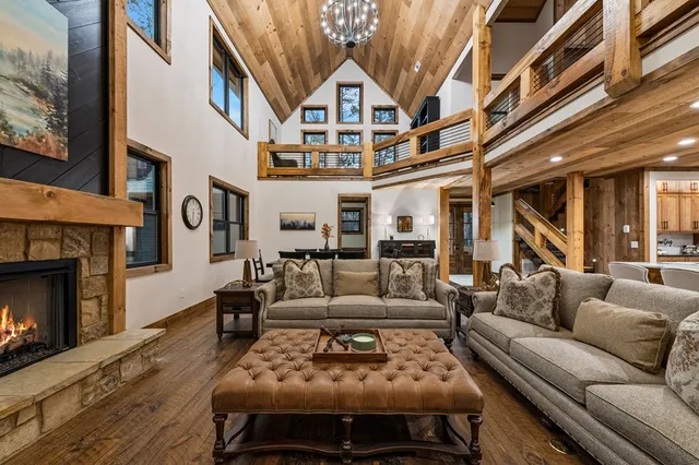 a view of a chairs and table on the wooden floor