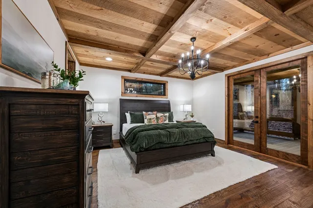 a bathroom with a double vanity sink toilet and shower
