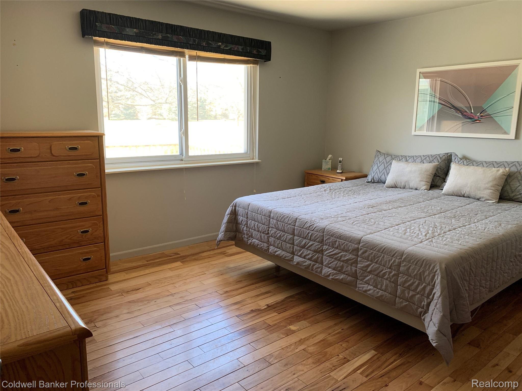 58150 Travis Road New Hudson, MI 48165 - Photo 17 of 24 Master Bedroom