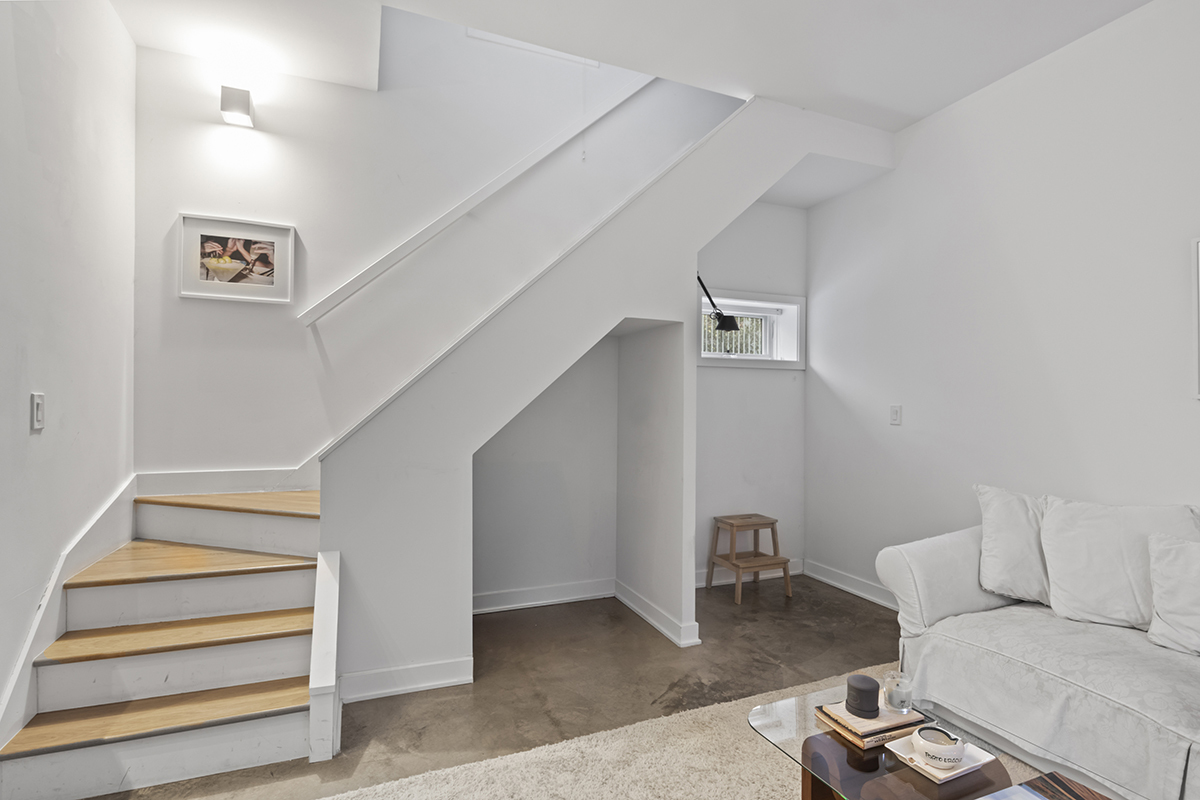 1226 North Dearborn Street, Unit B Chicago, IL 60610 - Photo 11 of 22 a living room with furniture and a stairs