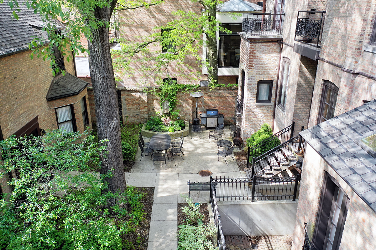 1226 North Dearborn Street, Unit B Chicago, IL 60610 - Photo 20 of 22 a view of an house with backyard and sitting area