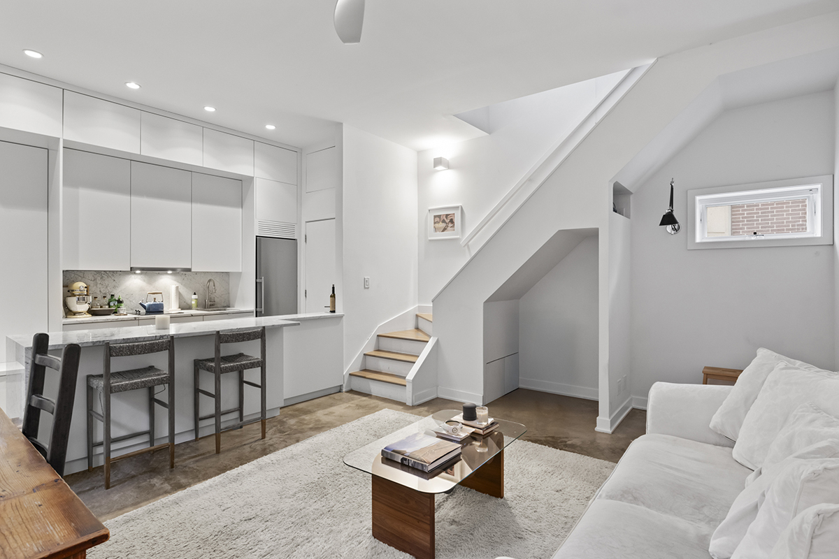 1226 North Dearborn Street, Unit B Chicago, IL 60610 - Photo 6 of 22 a living room with furniture and white walls