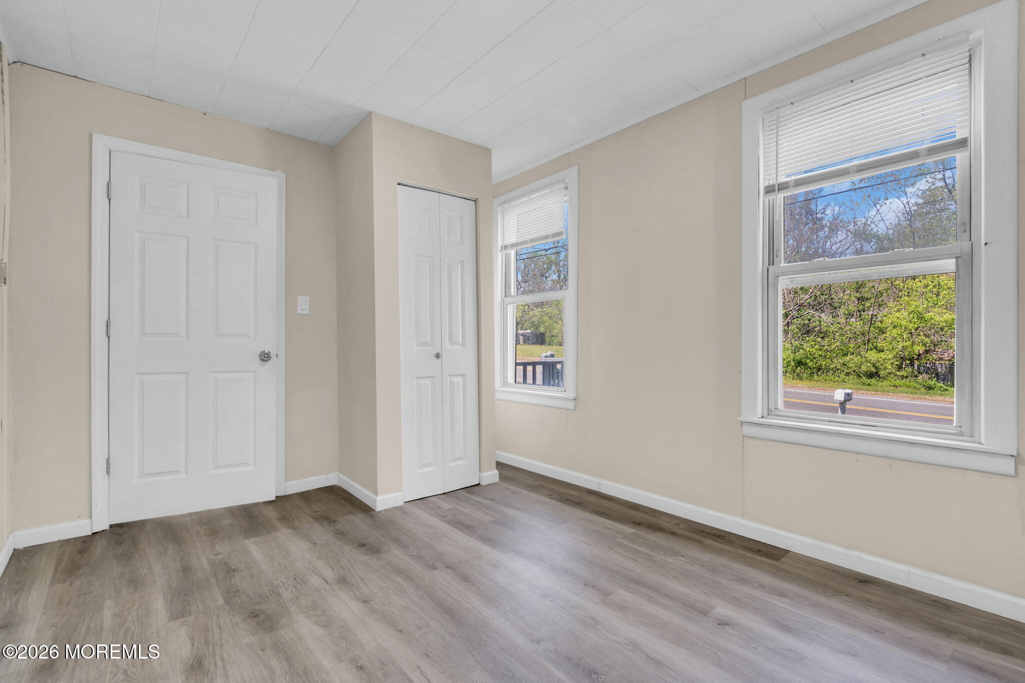 9 Arneytown-Hornerstown Road Cream Ridge, NJ 08514 - Photo 44 of 58 a view of empty room with window and wooden floor