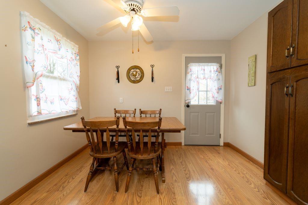 1446 Kinmount Street Pittsburgh, PA 15205 - Photo 12 of 38 a view of a dining room with furniture window and wooden floor
