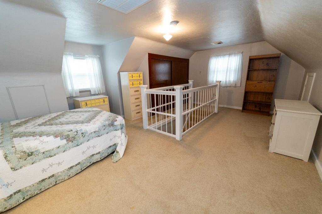 1446 Kinmount Street Pittsburgh, PA 15205 - Photo 21 of 38 a bedroom with furniture and a flat screen tv