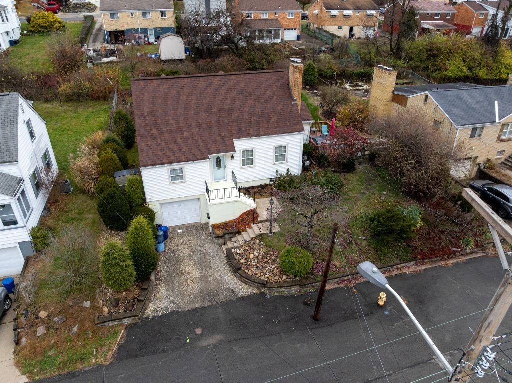 1446 Kinmount Street Pittsburgh, PA 15205 - Photo 4 of 38 an aerial view of a house with a yard